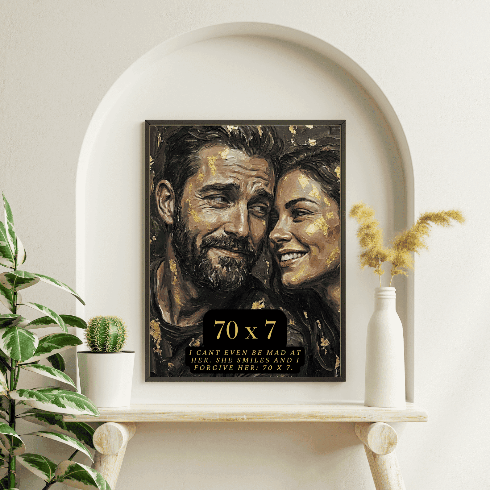 Framed artwork of a couple on a shelf with decorative elements.