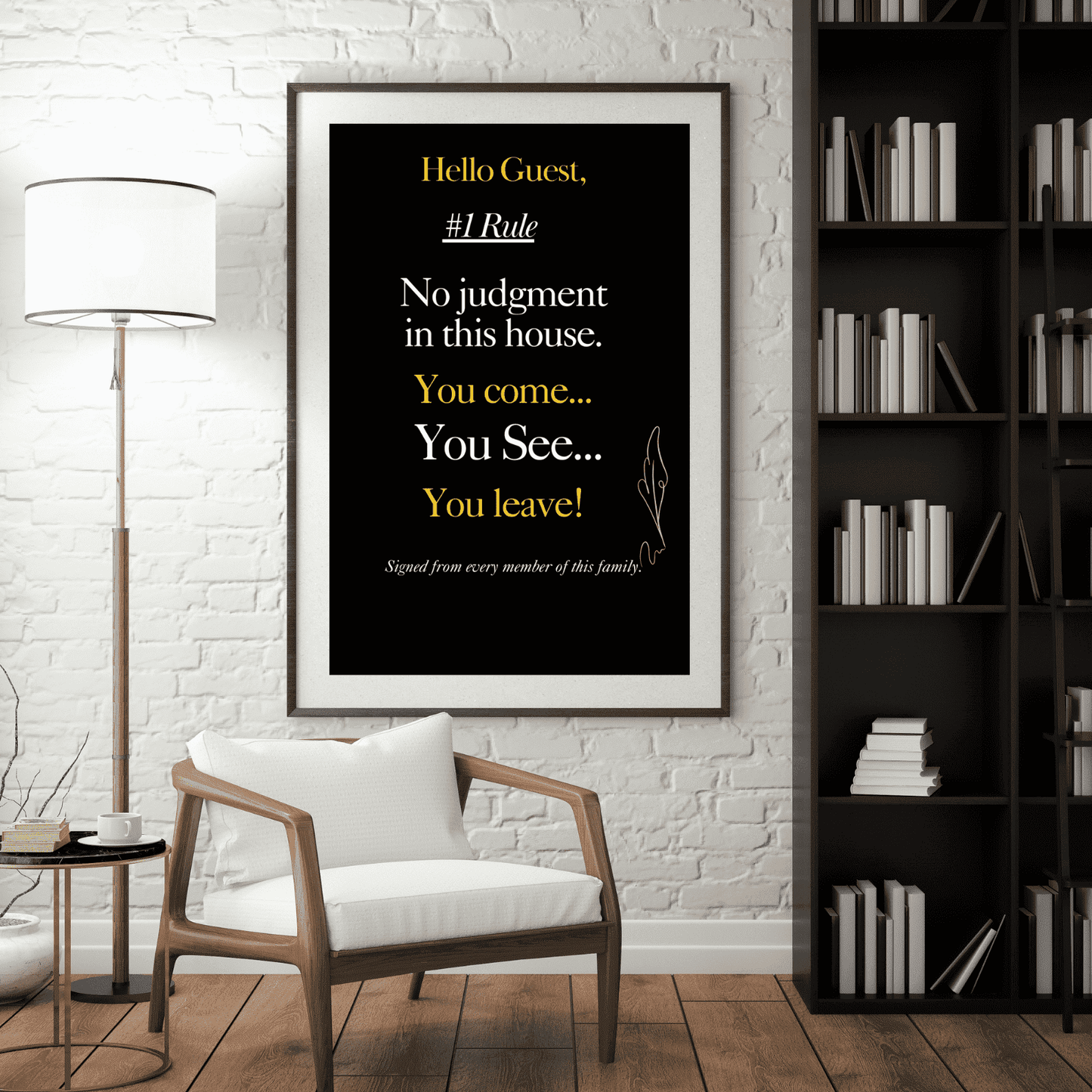 Framed quote on a wall in a room with a chair, lamp, and bookshelf.