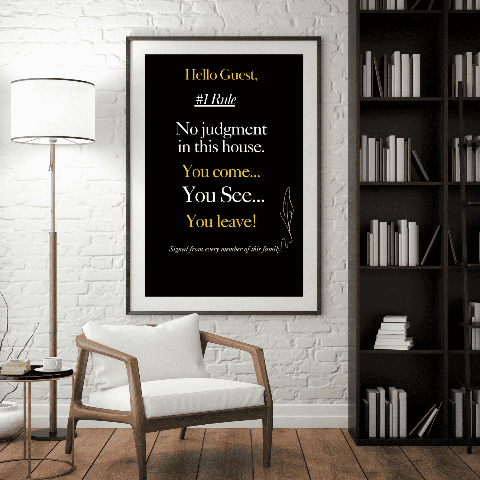 Framed quote on a wall in a room with a chair, lamp, and bookshelf.